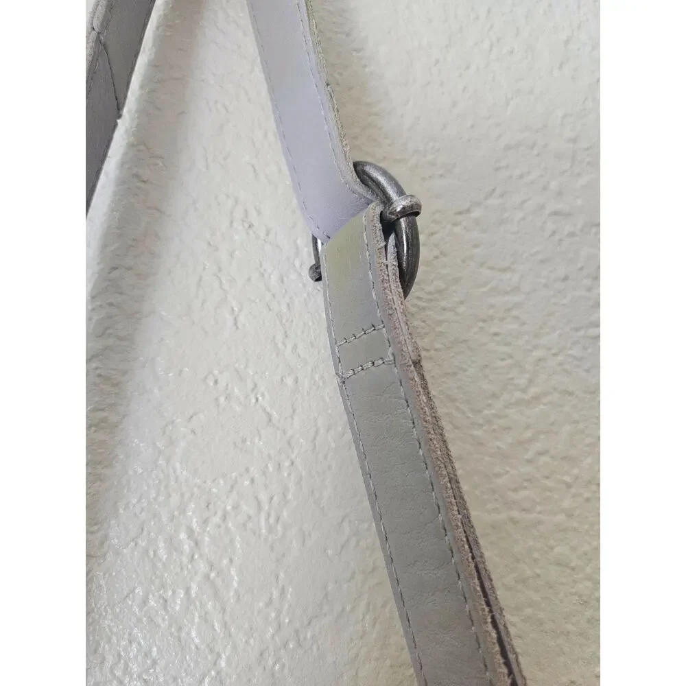 The Sak Stone Gray Leather Crossbody, adjustable, tassel detail